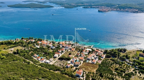 EXCLUSIVE POSITION 1 ST ROW TO THE SEA | Building land of 4.500 m2 with villa cca 400 m2 | Attractive location by the beach | Boat mooring | Beautiful view